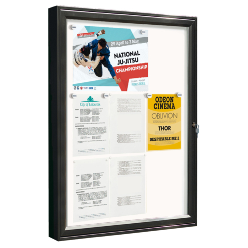 Small black framed notice board wit key in door