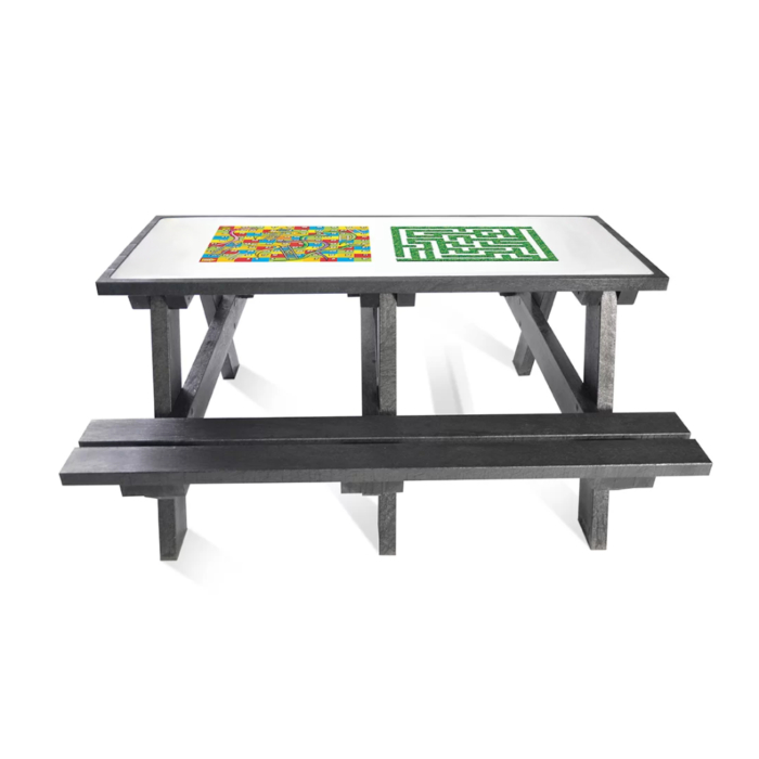 Black recycled plastic picnic table with snaked and ladders and maze games set in to the top