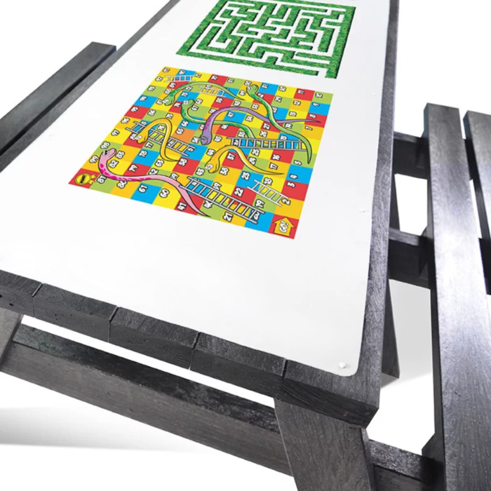 Close up of recycled plastic activity table with games set in to the top