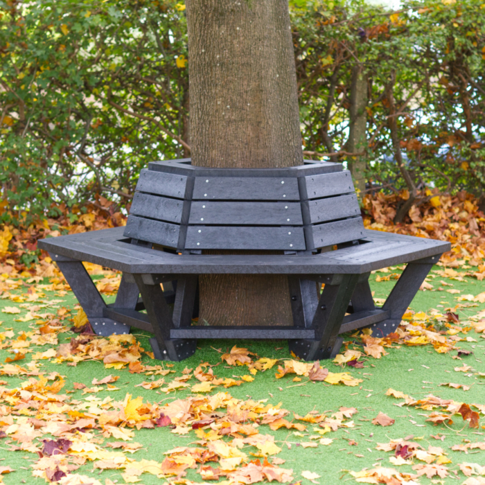 Black tree seat made out of recycled plastic.