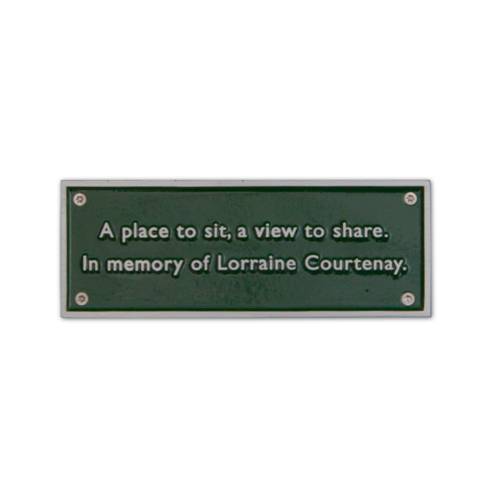Green cast aluminium plaque with silver writing