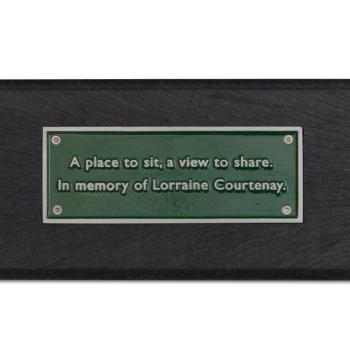 Green cast aluminium plaque set in to recycled plastic board