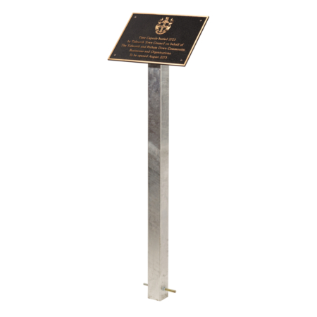 bronze metal plaque for a time capsule on a heavy duty stand.