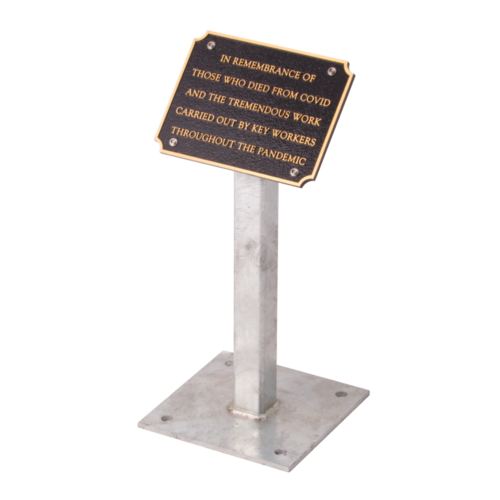 Cast bronze plaque with concaved corners on a metal stand