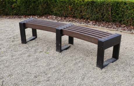 Curved Black and Brown Recycled Plastic Bench on Gravel