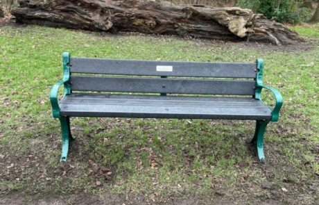 Cast iron and recycled plastic seat in a park