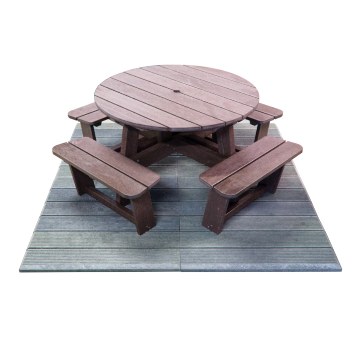 Round brown picnic table on a grey recycled plastic deck