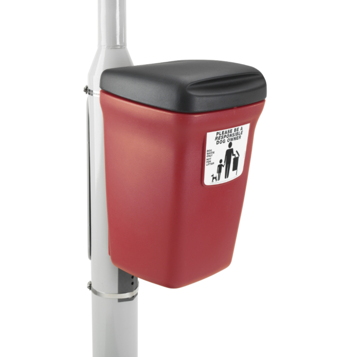 Red plastic dog waste bin with a black lid. It is attached to a sign post.
