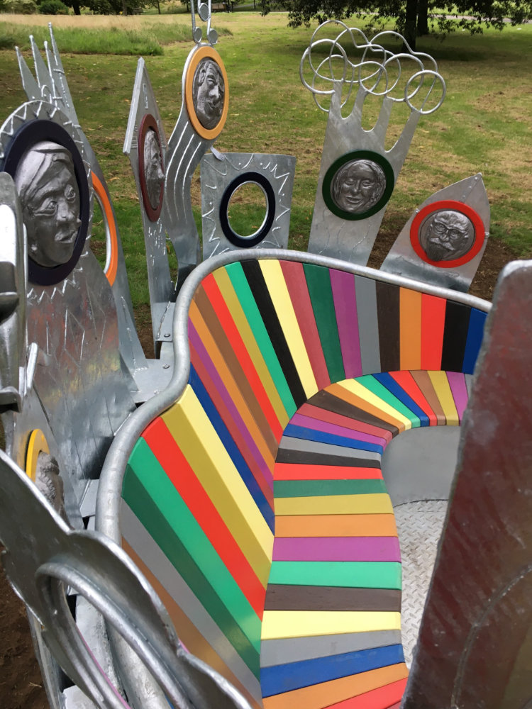 Here and Now Sculpture – Colourful Recycled Plastic Slats Galvanised and recycled plastic seat by sculptor Tim Tolkien