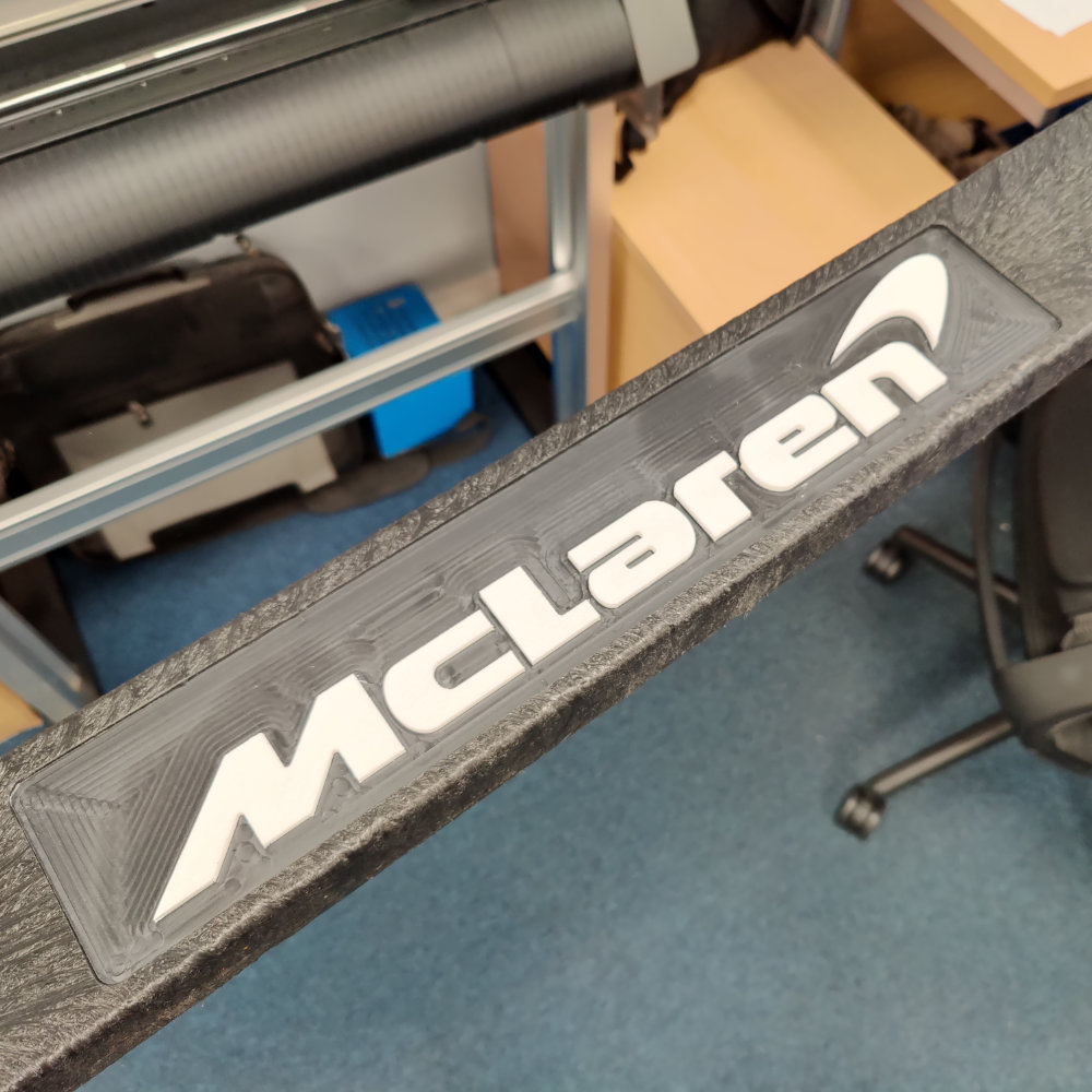 Recycled Plastic with inserted McLaren Cars logo