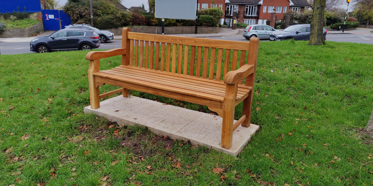 Balmoral teak seat in grassy park