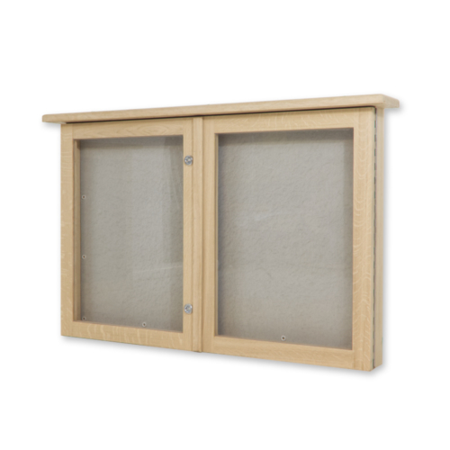 Oak two door notice board with doors closed