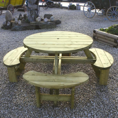 Round picnic table with curved seats attached.