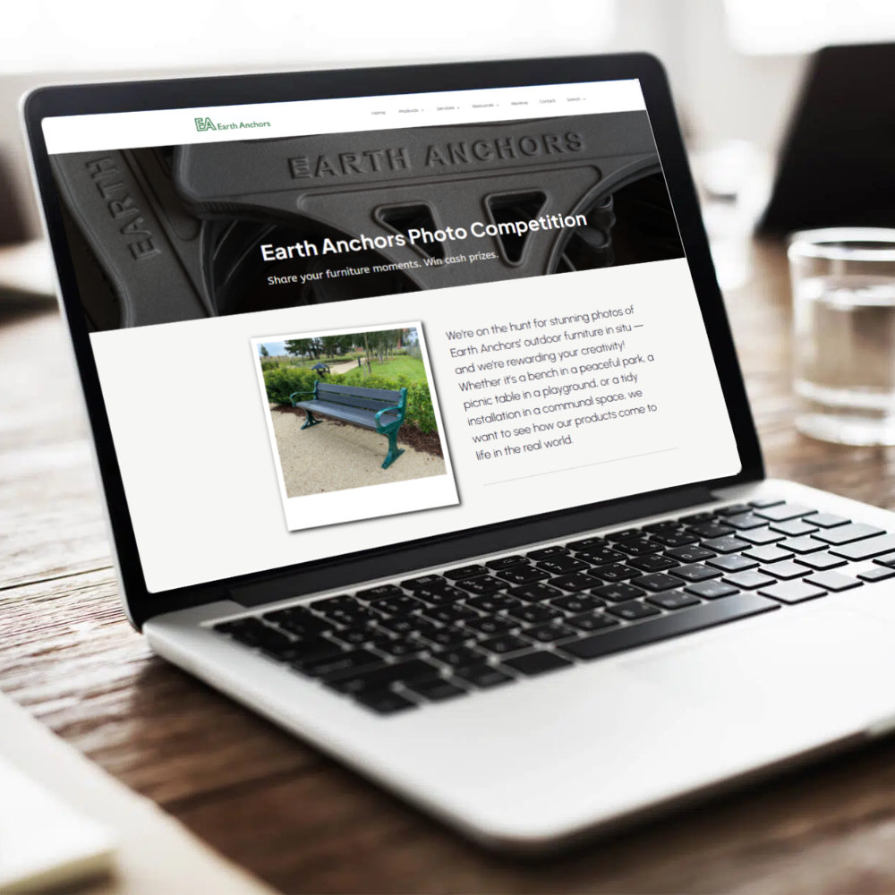 Photo of a laptop displaying earth anchors website competition