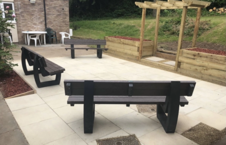 Moulded Benches with Backrests in Communal Garden
