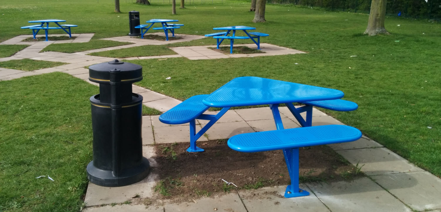 Blue Steel Perforated Picnic Tables in School Playground