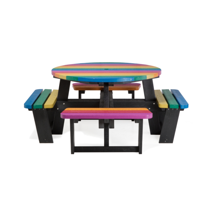 Multi coloured round recycled plastic picnic table.
