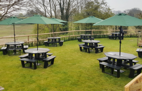 Tea Garden filled with octagonal recycled plastic picnic tables